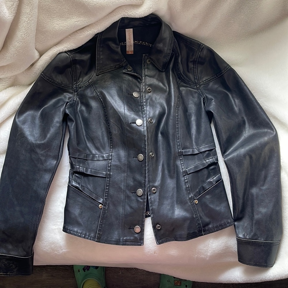 Black and cheetah print on the inside leather jacket